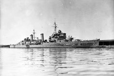 an old photo of a battleship in the water