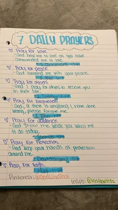 a notepad with writing on it that says 7 daily proves in blue and green