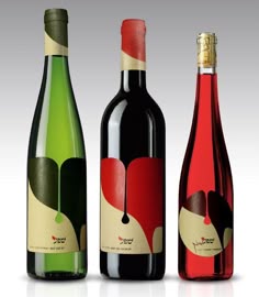 three different types of wine are shown in this image, one is red and the other is green