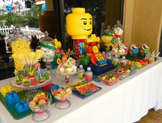 a table topped with lots of candy and candies
