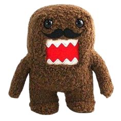 a stuffed animal with teeth and fangs on it's face