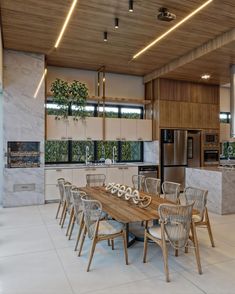 a kitchen with a table and chairs in it