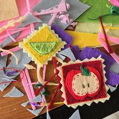 several pieces of felt are arranged on a table