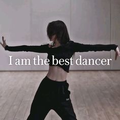 a woman is dancing on the floor with her arms spread out in front of her and words that read, i am the best dancer