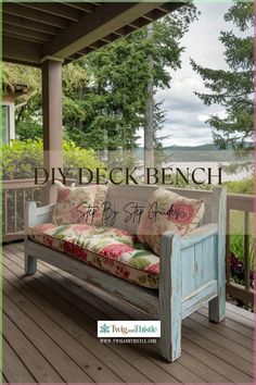 a bench sitting on top of a wooden deck