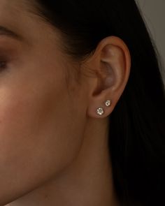 A jewelry essential that transcends trends and never go out of style – the diamond studs.  #diamondjewelry #diamondstuds #diamondearrings Fine Earrings Jewelry, Two Diamond Earrings, Ear Piercing Diamond, Earrings For Two Piercings, 2 Piercing Ideas, Random Ear Piercings, Best Earrings, Diamond Earrings Stud, Diamon Earrings