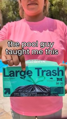 a woman in pink shirt holding up a large trash can with the caption that reads, the pool guy taught me this