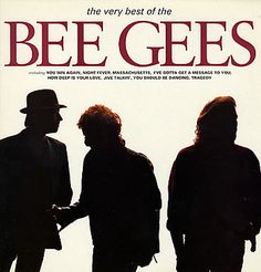 the very best of the bee gees album cover with three men standing in silhouette