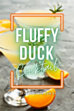 a close up of a drink in a glass with the words fluffy duck cocktail