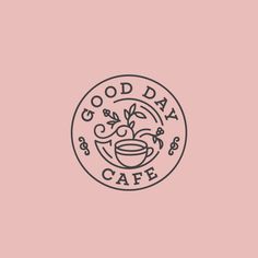 the good day cafe logo on a pink background