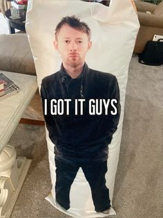 a bag with a photo of a man on it that says i got it guys