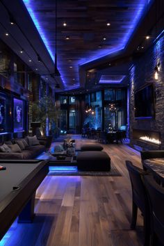 a living room filled with furniture and a pool table