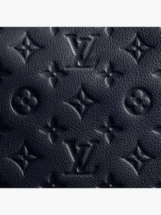 the louis vuitton logo is shown in black leather