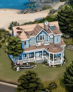 this is an artist's rendering of a large blue house in the woods by the beach
