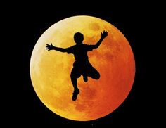 the silhouette of a person jumping in front of a full moon