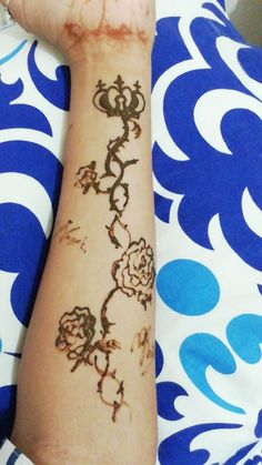 a person with a tattoo on their arm