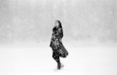 Dancing In The Snow, Dance In The Snow, Running Through Snow Gif, Walking Through Snow Gif, Running In Snow Gif, Black And White Icicle Photo, Black And White Winter Wolves, Walking In Blizzard, Man In Snow Storm