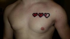 a shirtless man with three hearts on his chest and one heart in the middle