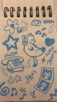 a notebook with some drawings on it