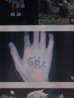 the hand is in front of an olympic logo on a screen with other images behind it