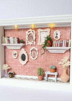 Shabby chic style brick wall with white shabby chic frames and shelves
