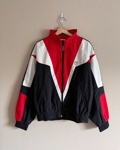 Red Track Jacket, Cool Red Jacket, Wind Breaker Jacket, Vest Hoodie Outfit, Track Jacket, Retro Black Red Jacket, Zip Jacket Outfit, Red And White Windbreaker, Red Sports Windbreaker Jacket
