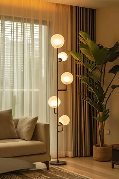 a living room scene with focus on the floor lamp and large potted plant in the corner