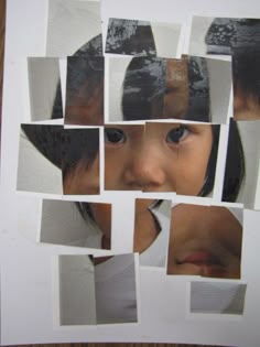 a child's face is surrounded by squares of paper
