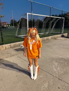 orange jersey, outfit inspo, jersey dress, bow hair, cute What To Wear To A Clemson Football Game, Megan Moroney Tennessee Orange Jersey, Vols Outfit, Simple Game Day Outfits, Tennessee Gameday Outfits, College Tailgate Outfits, Game Day Clothes, Cute College Football Game Outfit, Game Day Outfits Football