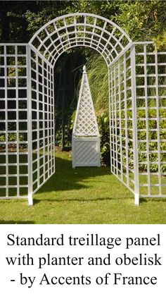 a white garden trellis with planter and obelisk by accents of france