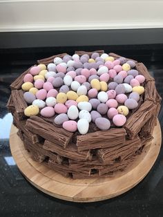 a chocolate cake with marshmallows and eggs on top