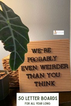 a wooden sign that says, we're probably even weirder than you think