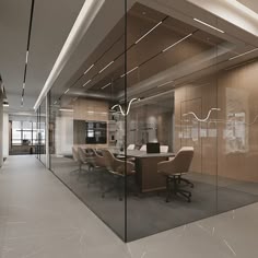 an empty conference room with glass walls and chairs
