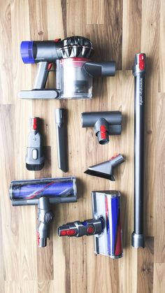 several different types of vacuums on a wooden floor