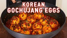 korean gochujuang eggs in a frying pan with the words korean gochujuang eggs above it