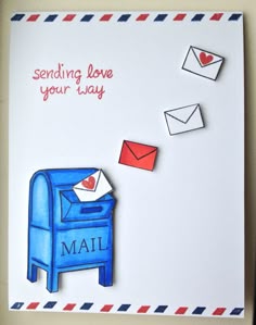 an envelope and mail are sitting on top of a post - it note with the word sending love your way