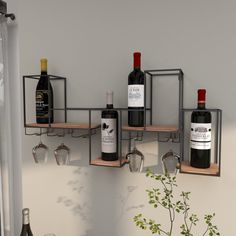 Decorate it with mini potted plants to bring the plain appearance to life. This item ships in 1 carton. Can be hung horizontally using the keyholes; nails and screws not included. Suitable for indoor use only. This item ships fully assembled in one piece. Maximum weight limit is 50 lbs. This is a single black colored wall mounted wine holder. Contemporary style. Black wall wine rack can hold 6 average wine bottles. Grayson Lane 6 -Bottle Black with 5 Glass Holder Slots Iron Wall-Mounted Wine rack one_size | 92189 Wine Rack For Wall, Wall Mounted Wine Rack Ideas, Wall Wine Rack Ideas Dining Rooms, Wine Wall Ideas Home Decor, Wine Bottle Wall Sconces, Industrial Wall Mounted Wine Rack, Diy Wall-mounted Wine Holder, Wine Bottle Holder Wall, Contemporary Wine Racks