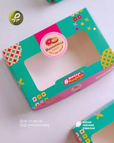 two boxes that are sitting next to each other