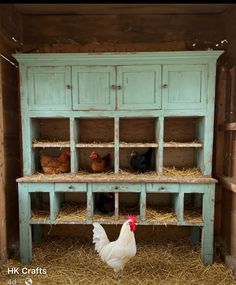 chickens and roosters in a barn with hay on the floor, chicken hutch