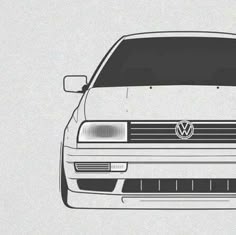 the front end of a white volkswagen car