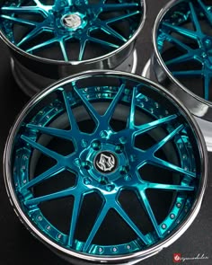 some blue wheels are sitting on the table