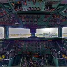 the cockpit of an airplane with multiple instruments