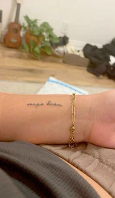 a woman's arm with a tattoo that reads, may you be brave on it