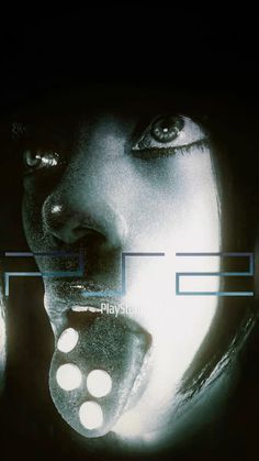 a woman's face is shown with glowing eyes