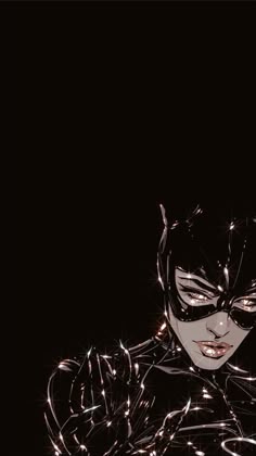 a woman wearing a catwoman mask and glowing lights in the dark with her hands behind her head