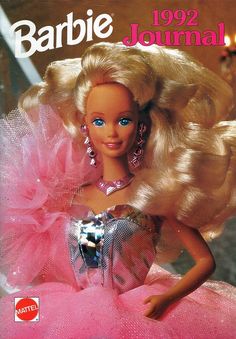 the cover of barbie's 922 journal shows a doll in a pink dress