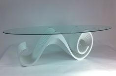a glass table with white swirls on it