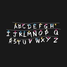 the letters and numbers are drawn in chalk on a blackboard with colored lights around them