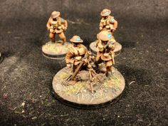 some toy soldiers are standing on the ground