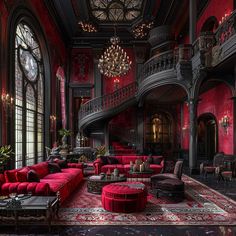 a large living room with red couches and chandeliers